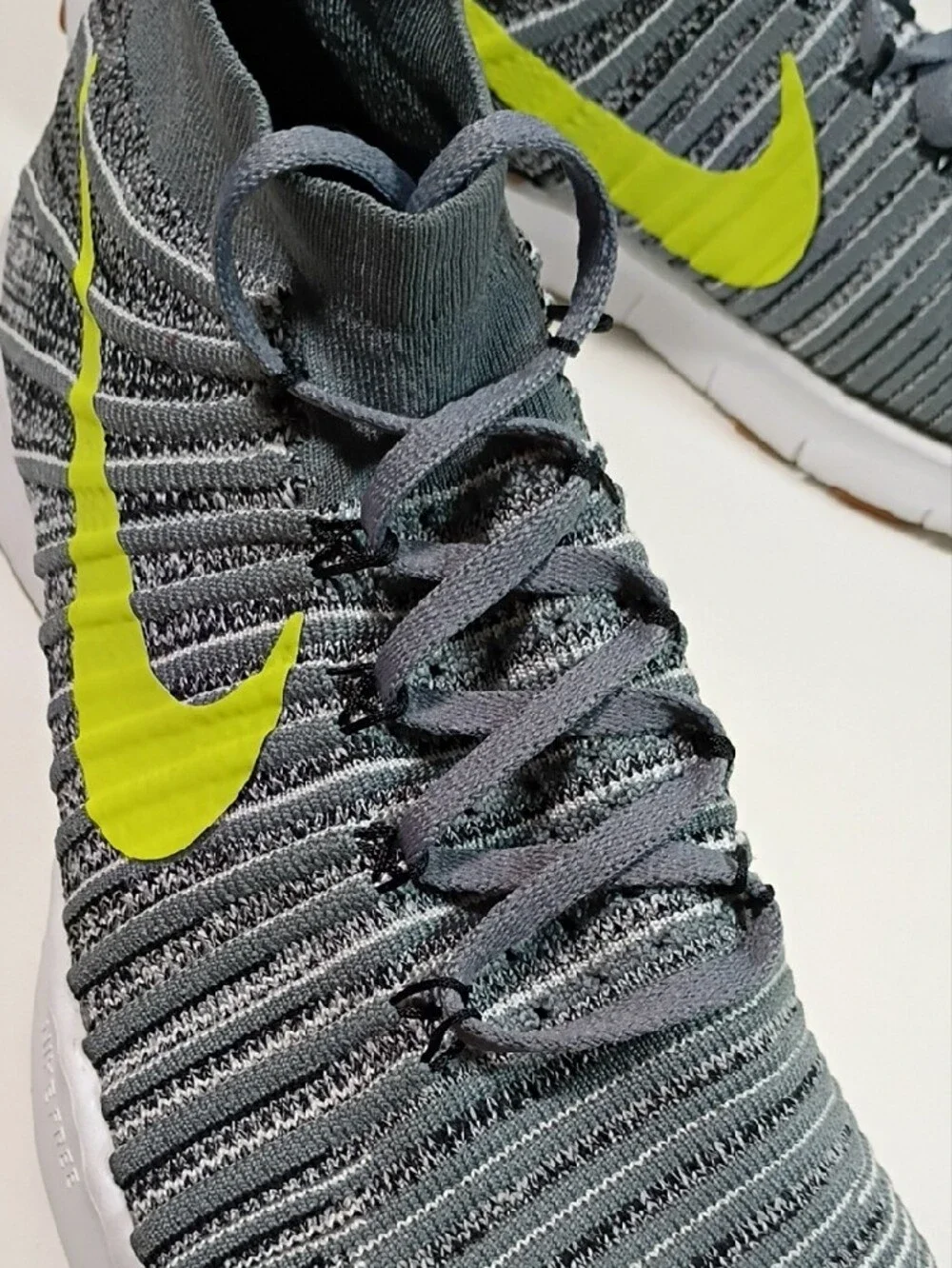Nike Men’s Grey Flyknit Athletic Shoes with Neon Yellow Swoosh Size 10